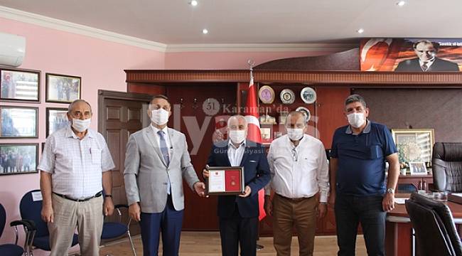 Esnaf Odaları Birliğine Madalya ve Teşekkür Belgesi