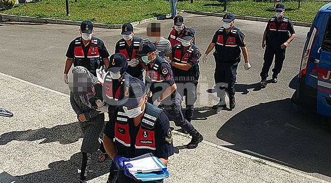 Karaman'da cinayet zanlısı kadın ve eşi adliyeye sevk edildi