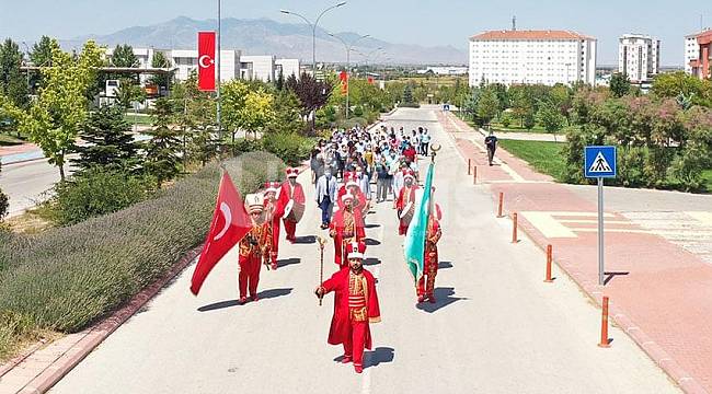KMÜ'de "Zaferler Ayı Ağustos"temasıyla yürüyüş ve panel düzenlendi