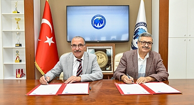 KMÜ ile KGTÜ arasında protokol imzalandı