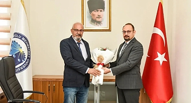 KMÜ'de Bayrak Değişimi