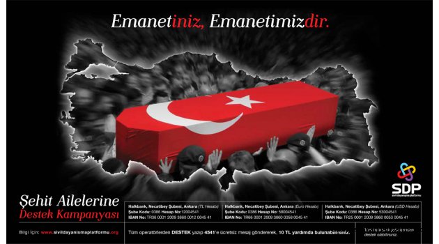 DARBE ŞEHİT AİLELERİNE YERDIM