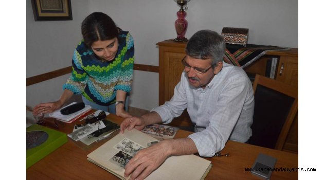 KARAMAN EVİNİN KAPISINI GÜLEN YÜZÜYLE AÇTI